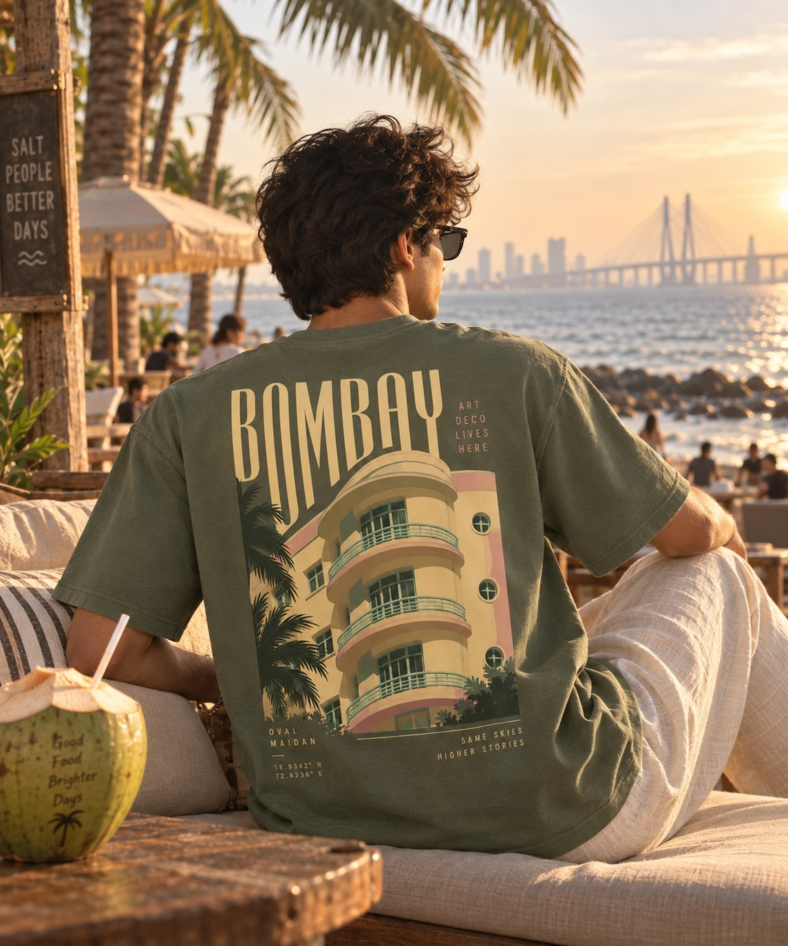 Bombay Palm oversized terry t-shirt in jade, Art Deco back print, worn by a model