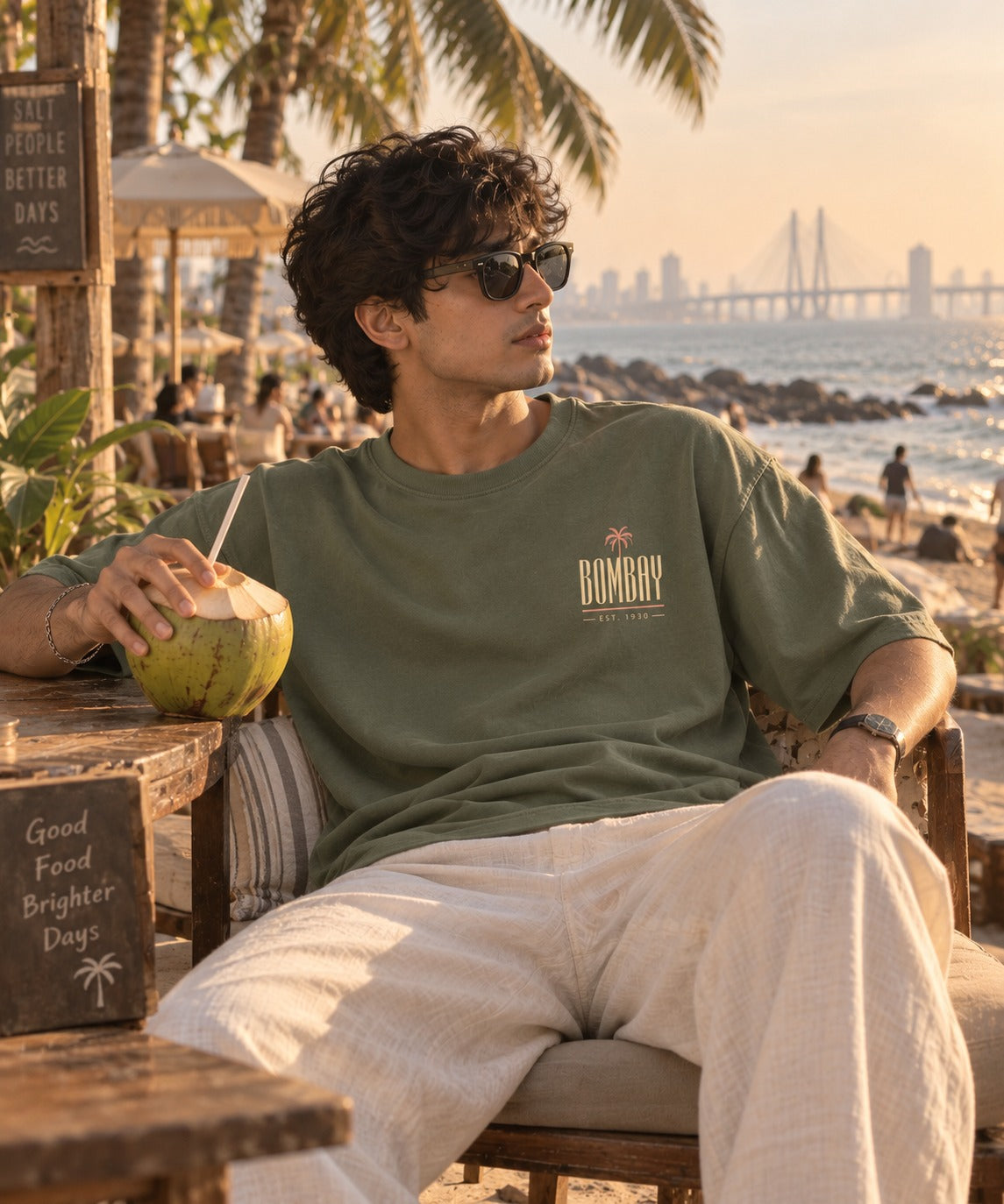Bombay Palm oversized terry t-shirt in jade, front chest print, worn by a model