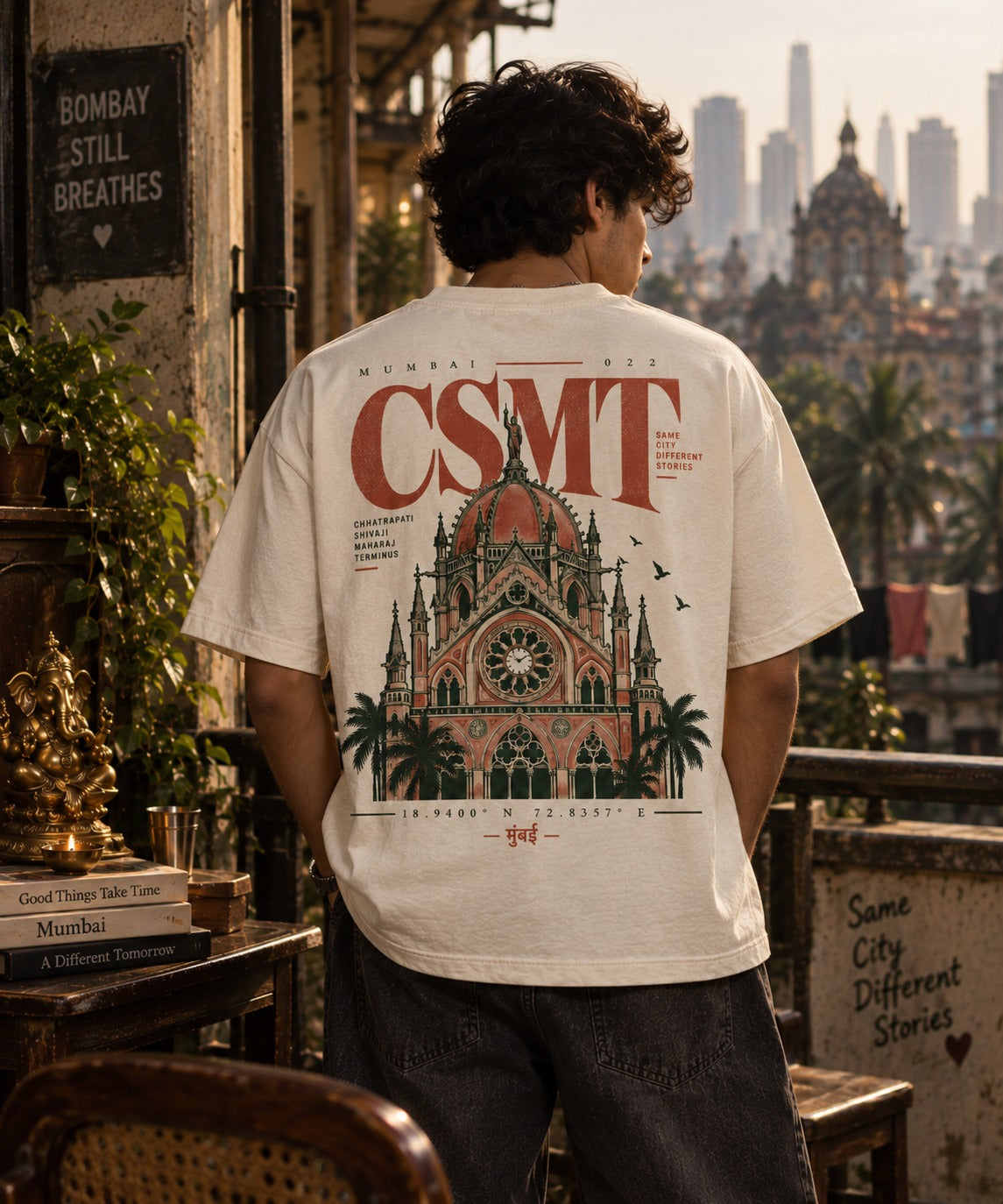 CSMT oversized t-shirt in off white, back print, worn by a model