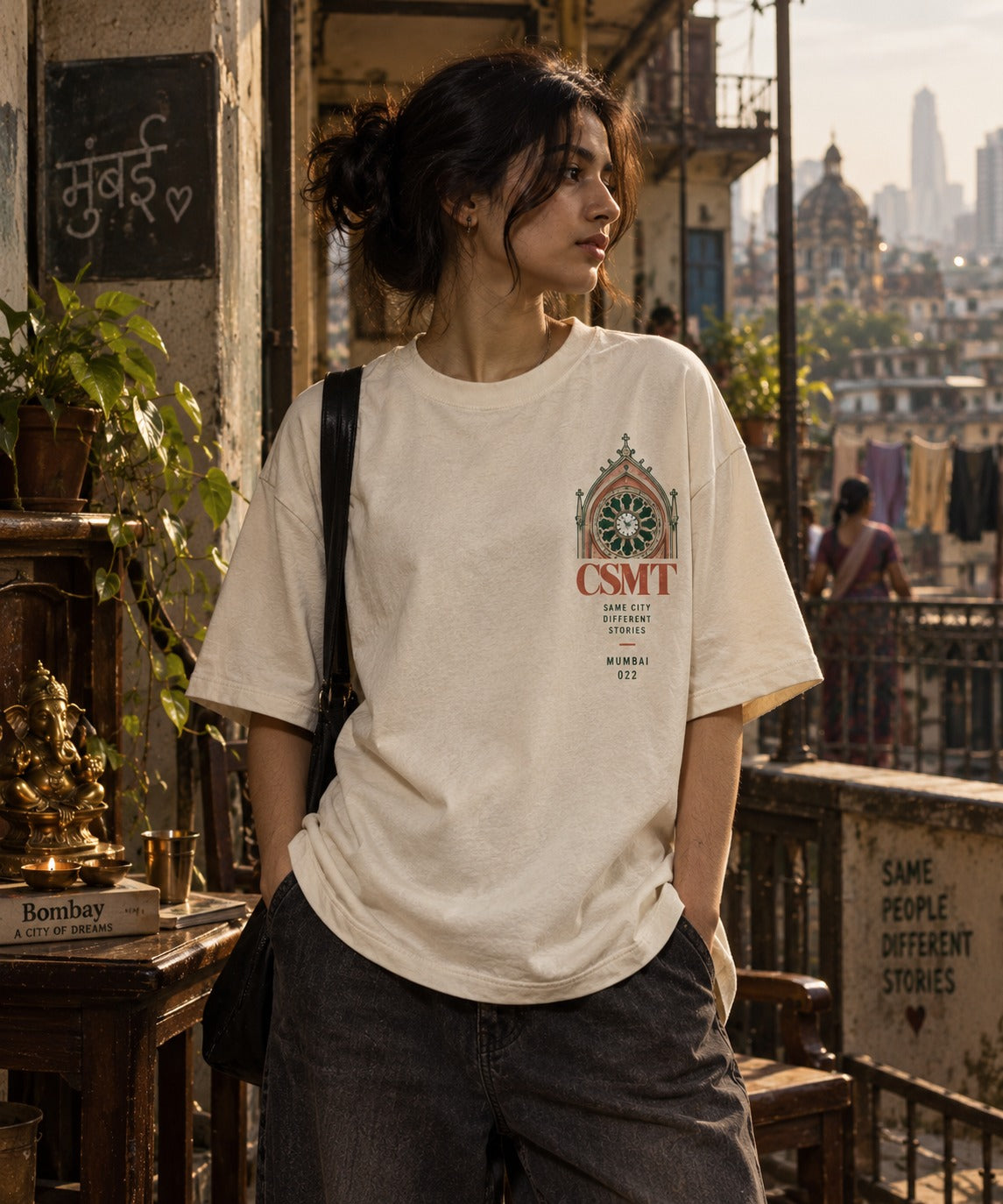 CSMT oversized t-shirt in off white, front chest print, worn by a model