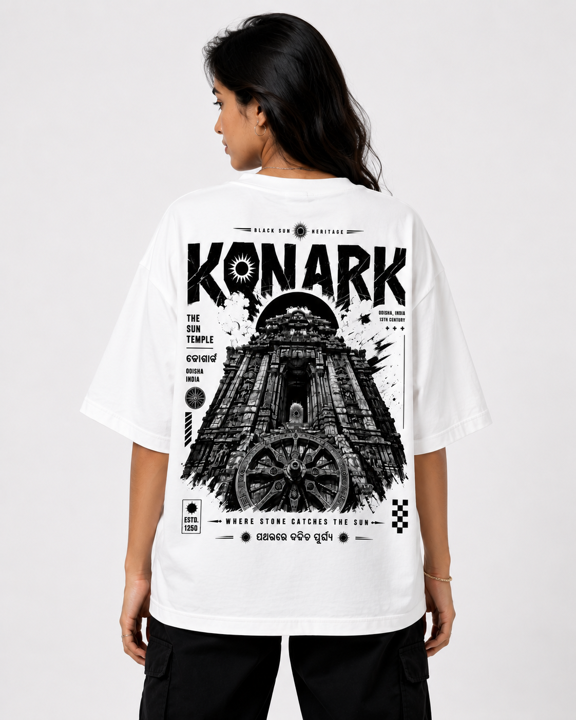 Konark oversized terry t-shirt in white, back print, worn by a model