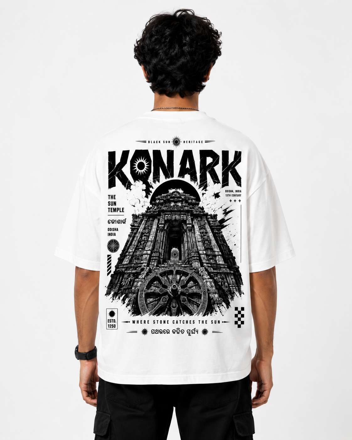Konark oversized terry t-shirt in white, back print, worn by a model