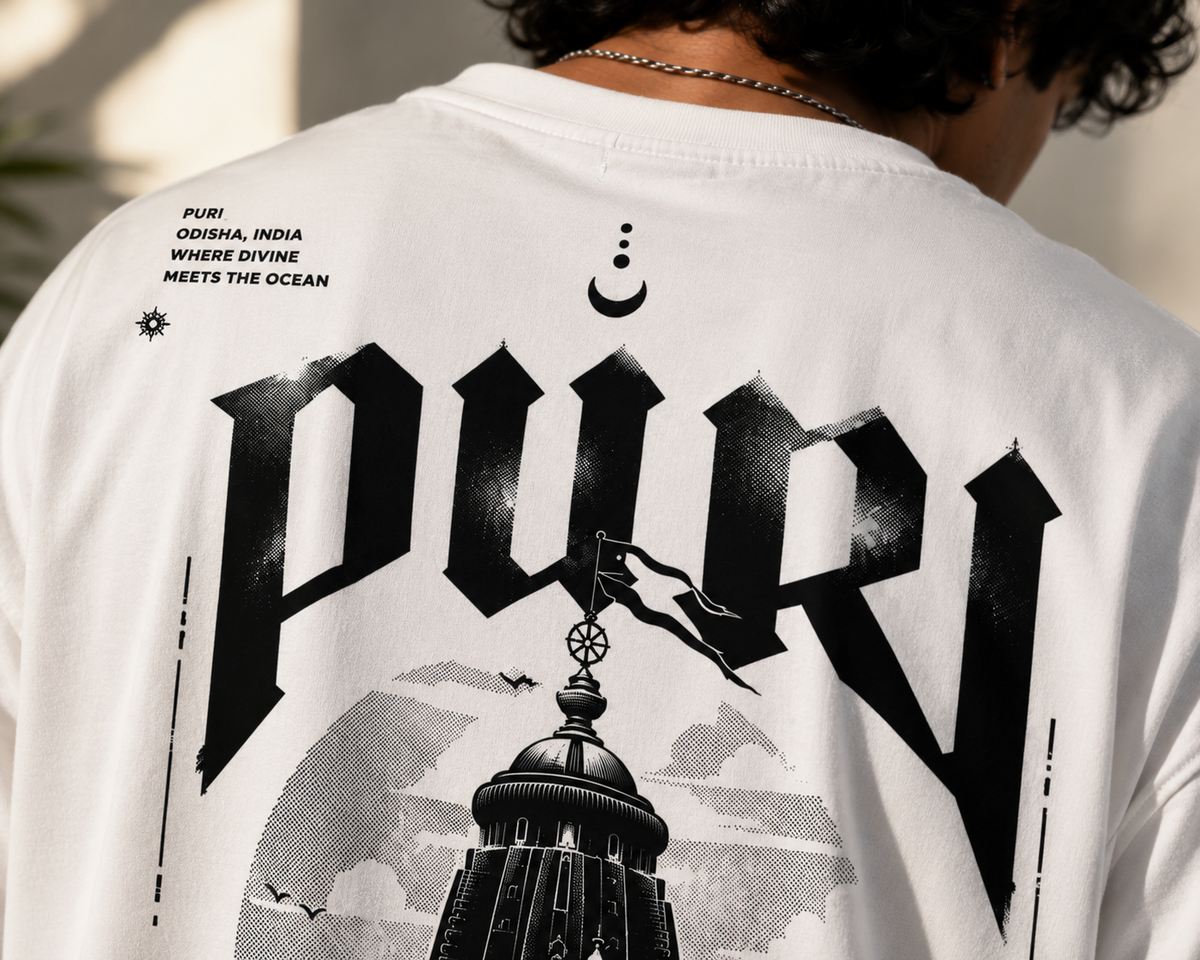 Puri oversized t-shirt in white, print close-up, worn by a model