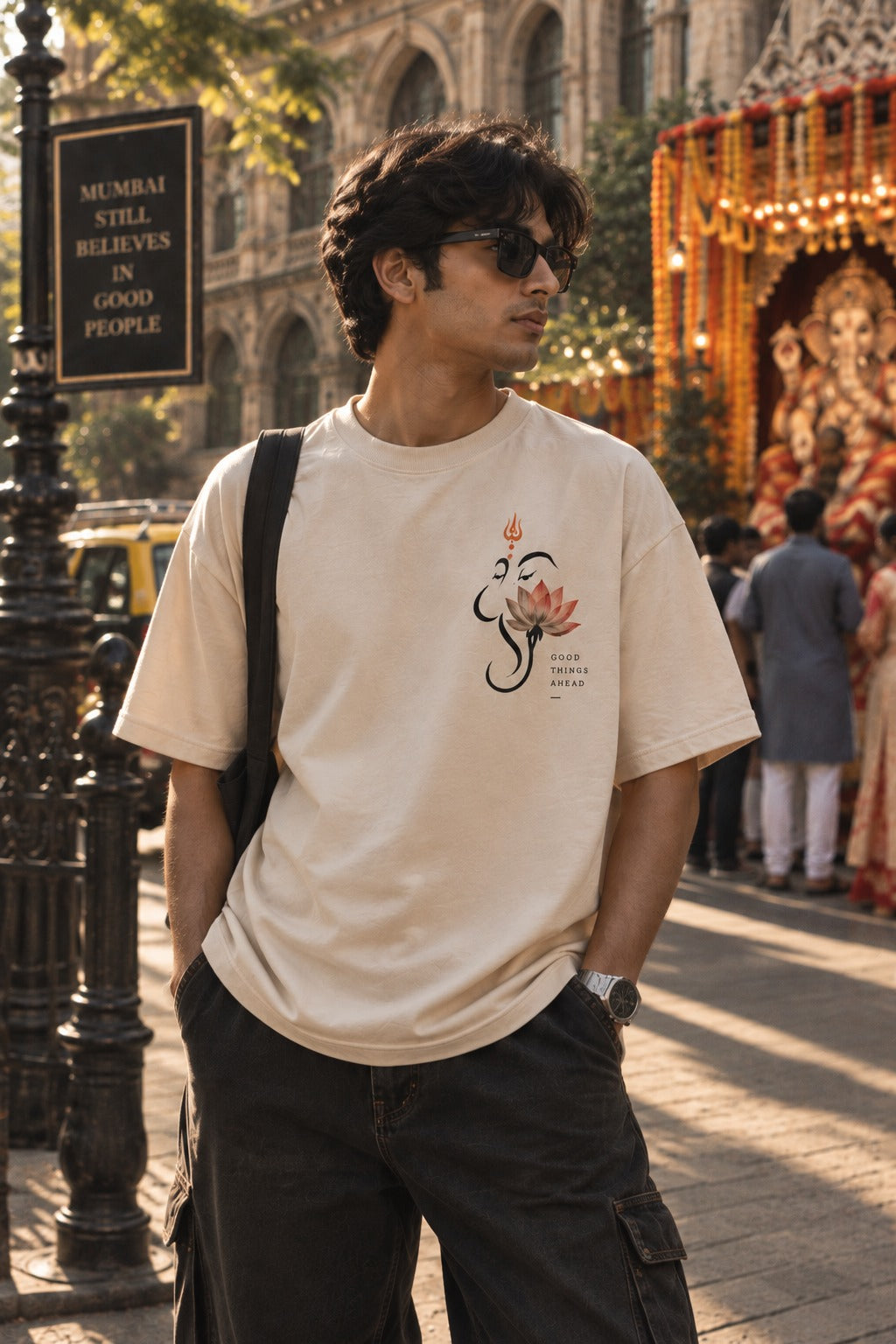 Lotus Bappa oversized t-shirt in off white, front chest print, worn by a model