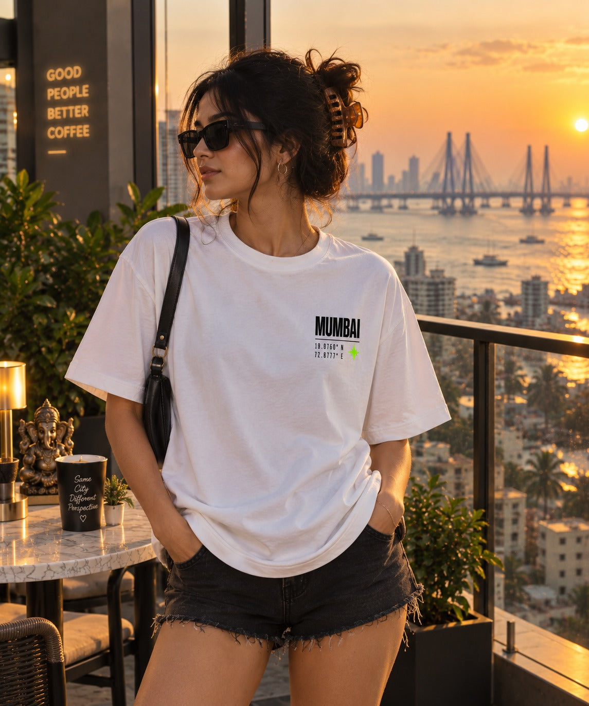 Mumbai Coordinates oversized t-shirt in white, front chest print, worn by a model