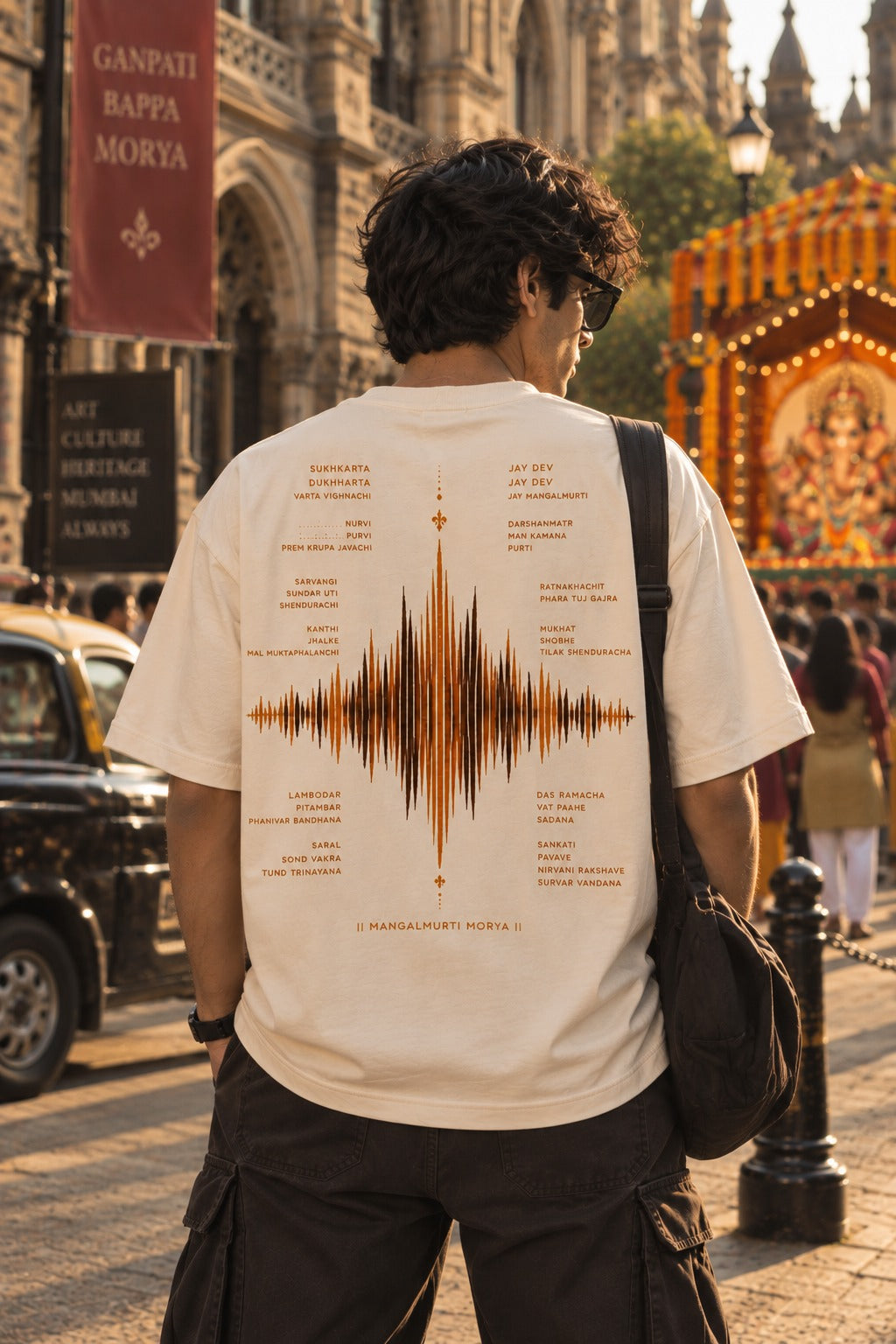 Sukhkarta oversized t-shirt in white, aarti back print, worn by a model