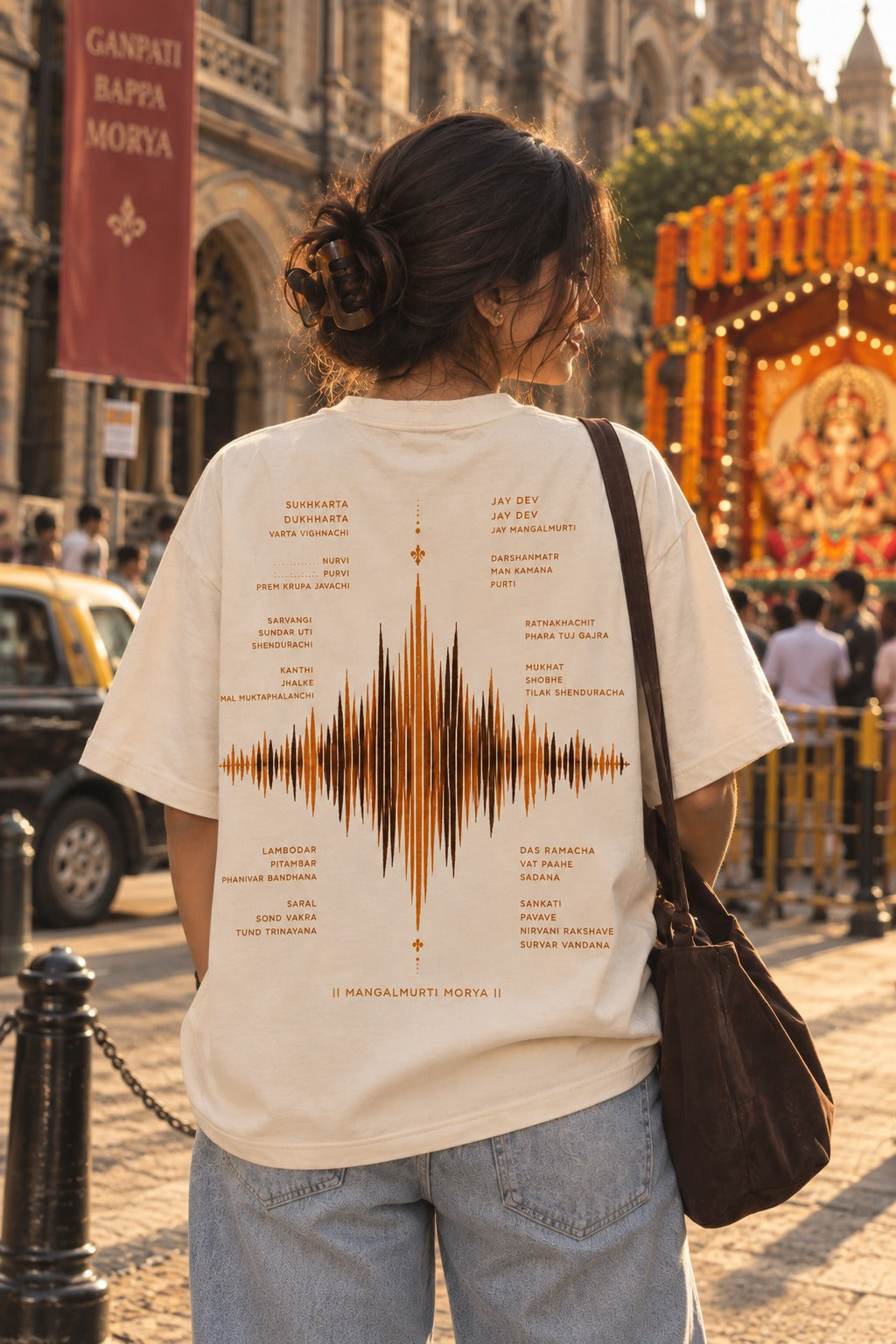 Sukhkarta oversized t-shirt in white, aarti back print, worn by a model