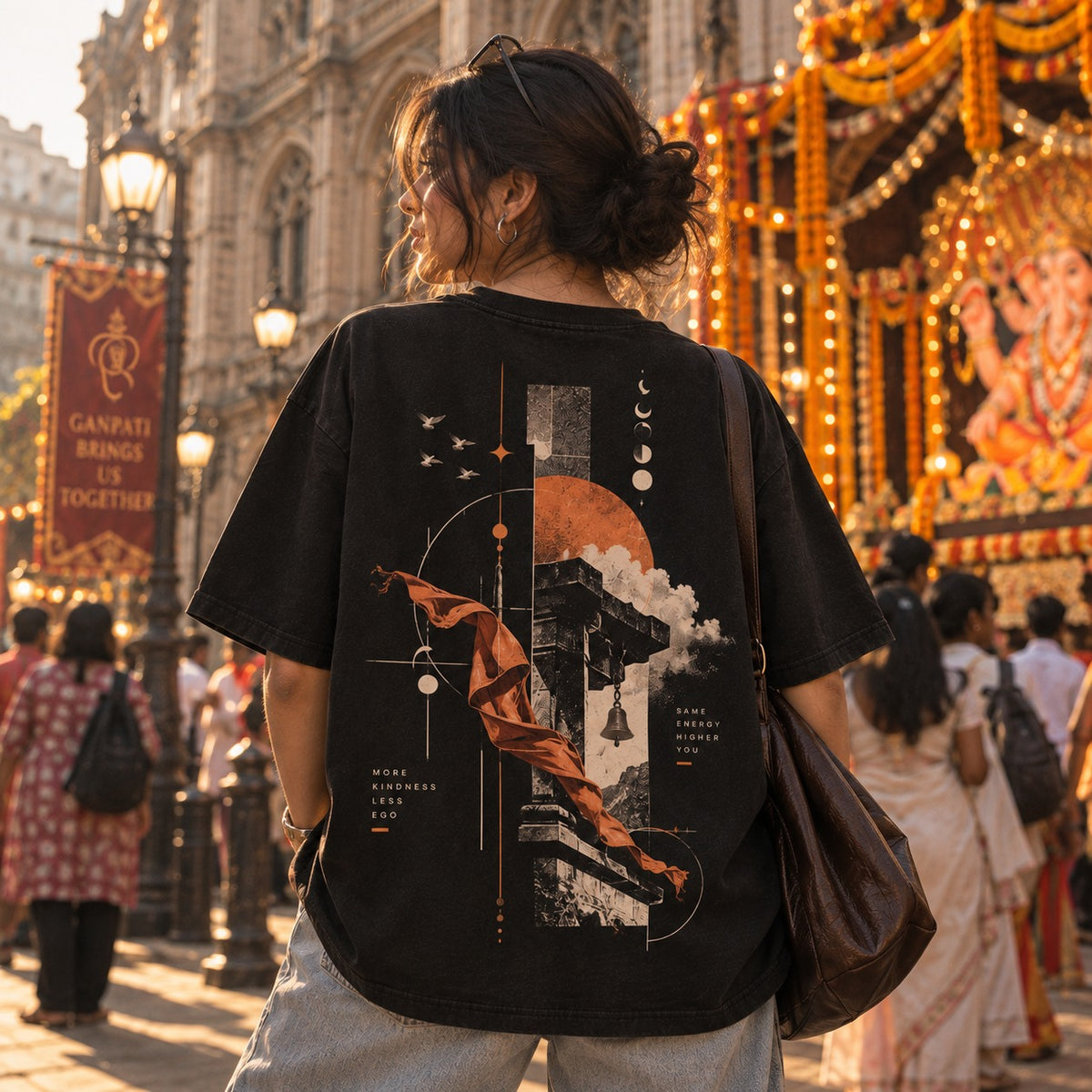 Good Things Ahead oversized t-shirt in black, temple bell back print, worn by a model