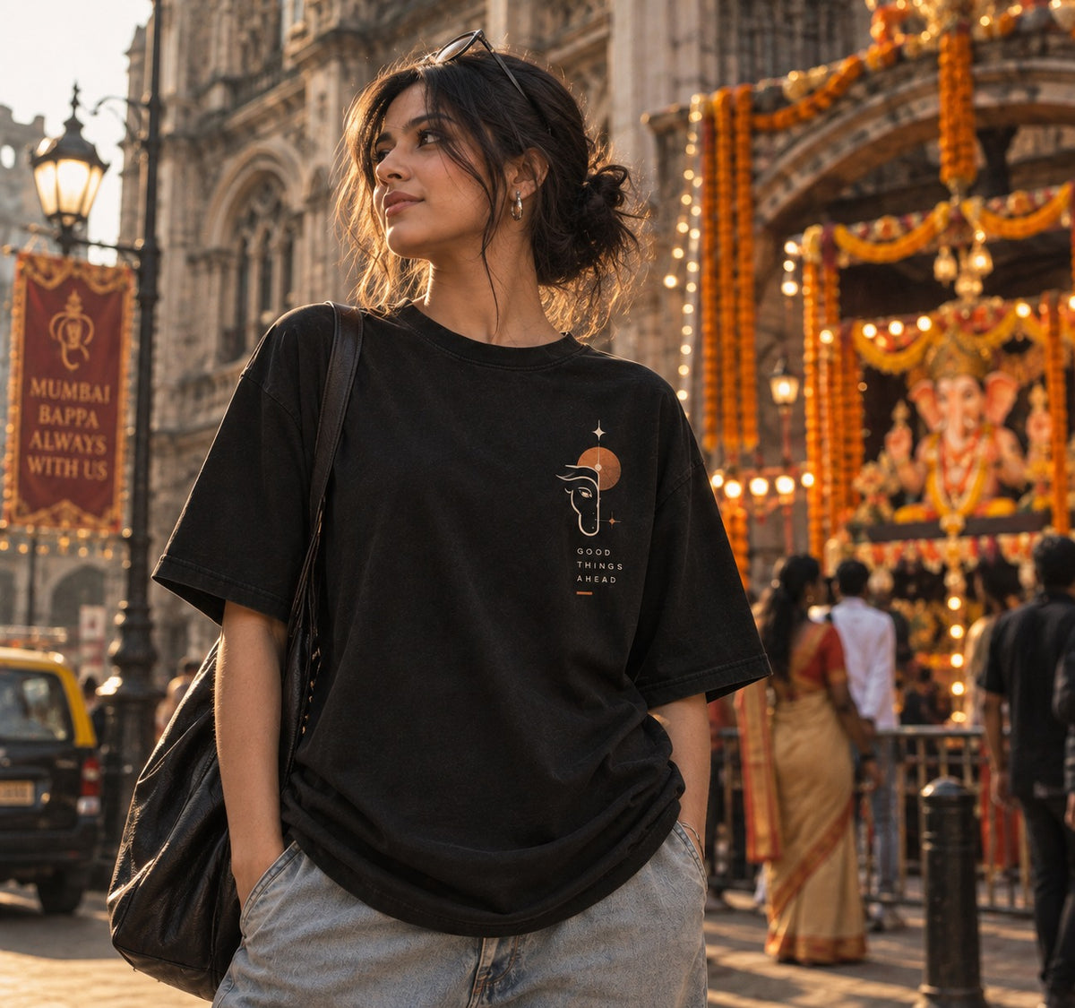 Good Things Ahead oversized t-shirt in black, front chest print, worn by a model