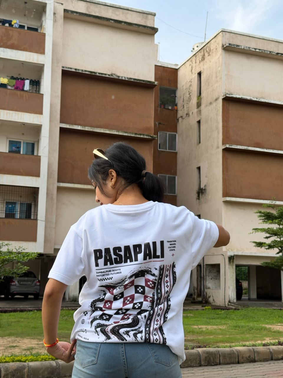 Pasapali oversized terry t-shirt in white, back print, worn by a model
